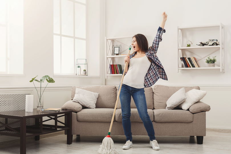 gallery/canva-happy-woman-cleaning-home-with-mop-and-having-fun